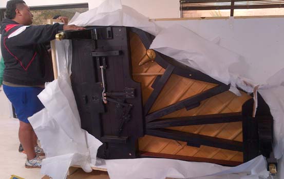 Unboxing a Grand Piano delivery