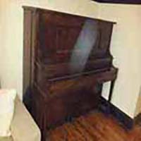Reliable Piano Removalists Moving a upright pianola